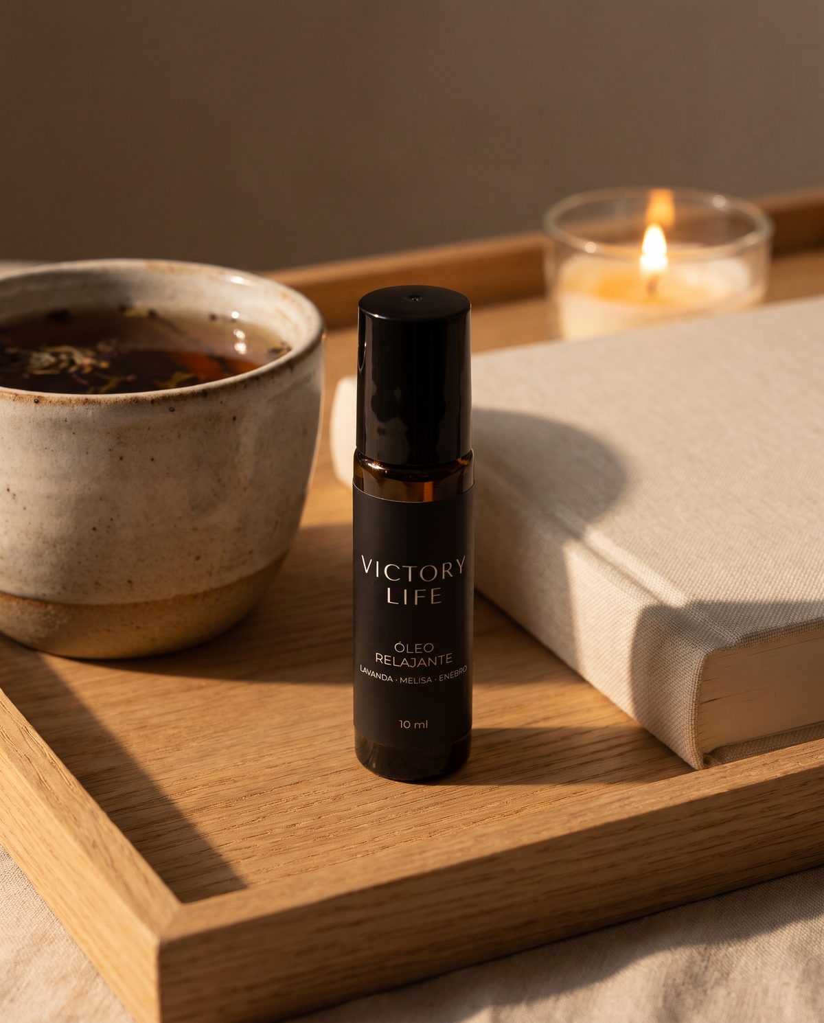 Ritual nocturno con té, vela y óleo Victory Life